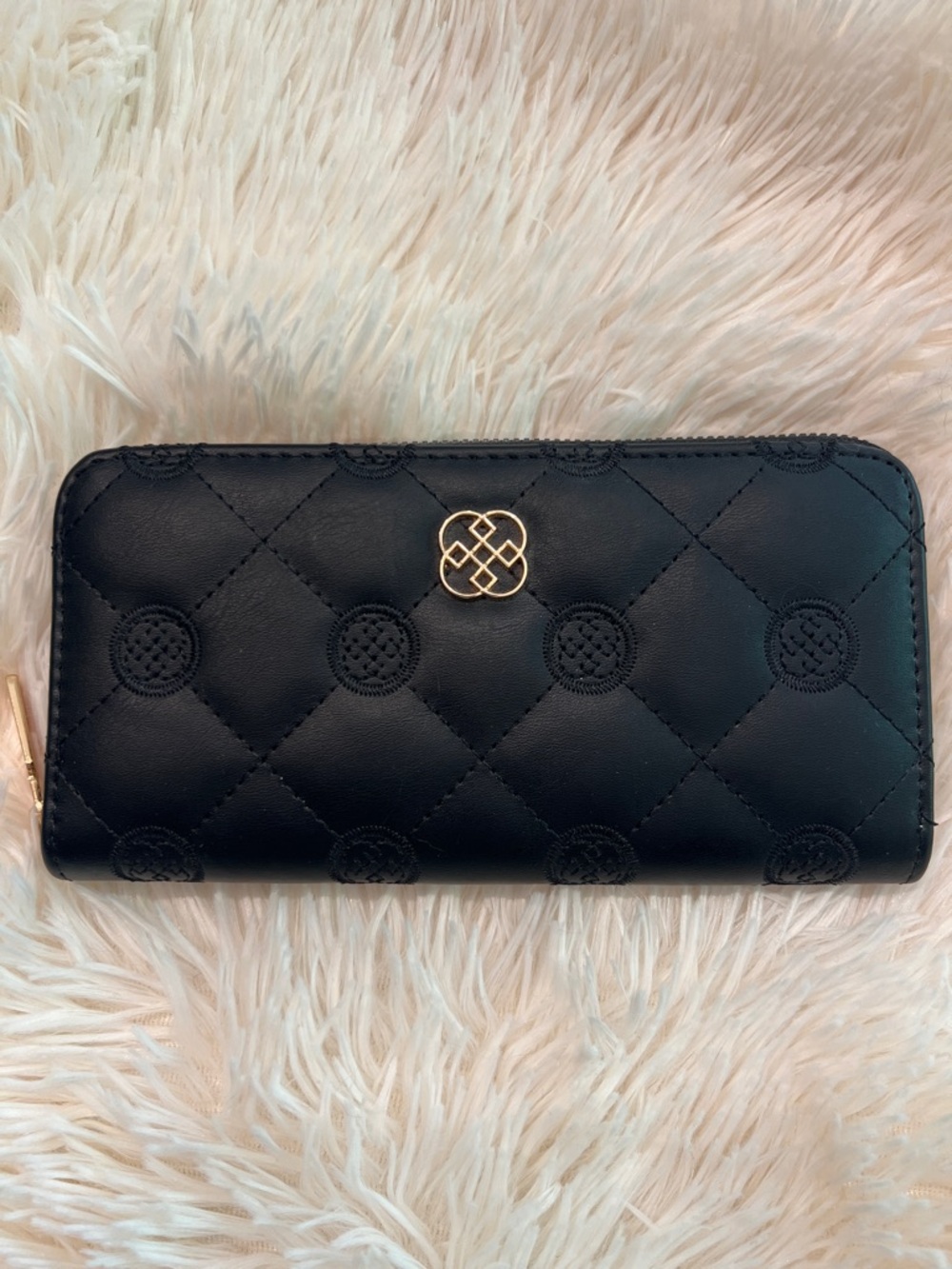 Quilted Black Zip-Around Wallet with Gold Logo